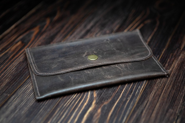 Brown men's clutch made of genuine leather
