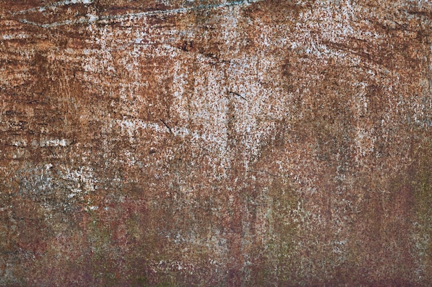 Foto sfondo di metallo marrone. vernice versata. struttura del metallo