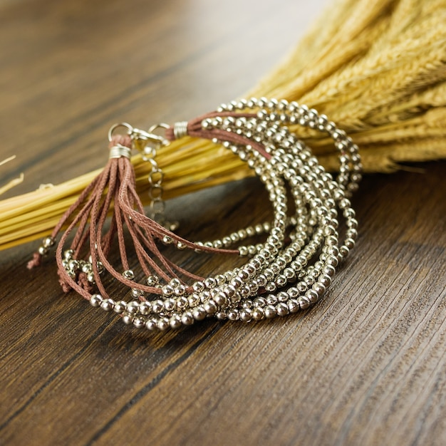 Brown multi strand bracelet  with dry grass 