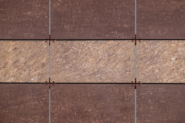 Brown panels for building facades with fixing