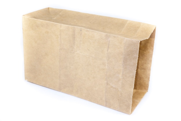 Brown paper bag on white background