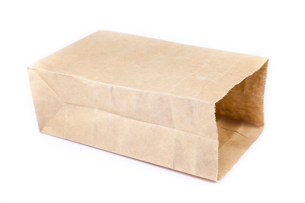 Brown paper bag on white background