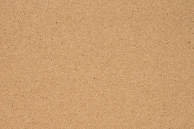 Photo brown paper or cardboard texture background.