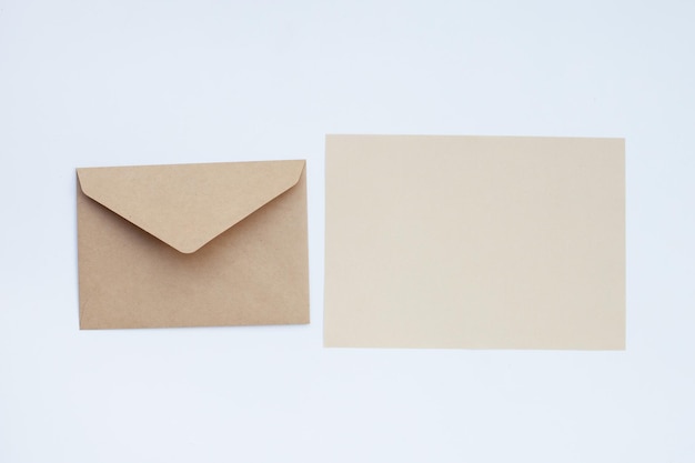 Brown paper and envelopes on white background