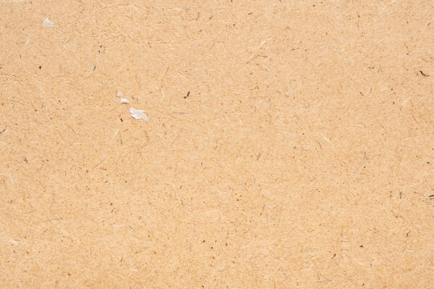Текстура переработанного листа коричневой бумаги