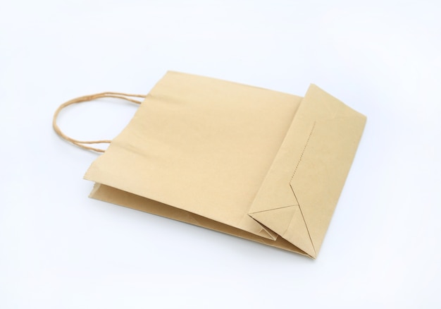 Brown paper shopping bags isolated on white background