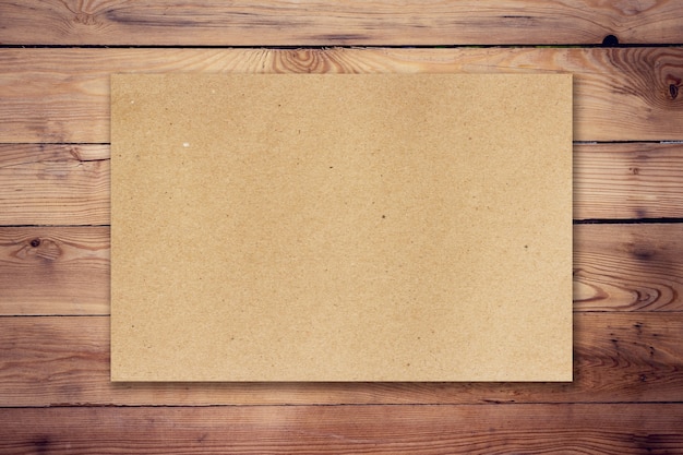 brown paper on wood background and texture