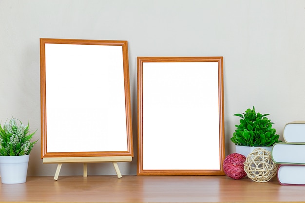 brown picture frame on wood table.