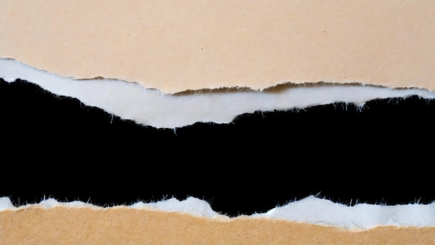 a brown piece of paper with a black stripe on it