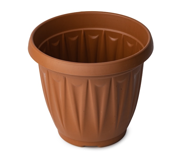 Brown plastic flower pot isolated on white