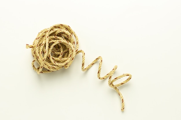 Brown plastic rope isolated on white background.