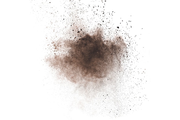 Photo brown powder explosion isolated on white