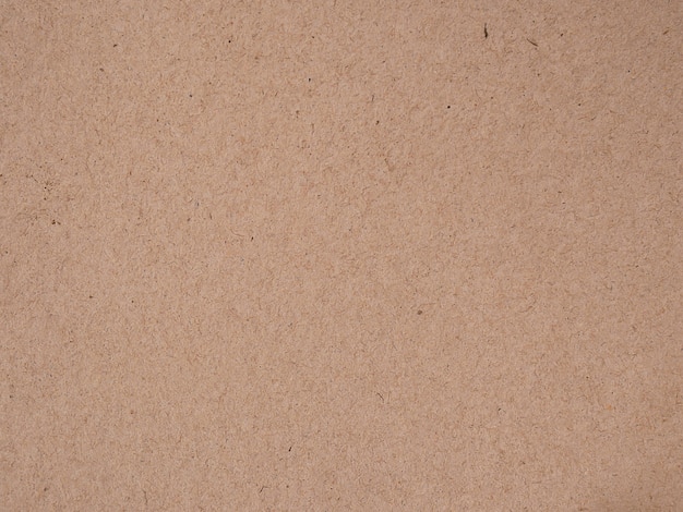 Photo brown recycled old paper texture or brown craft carton old rough plain light cardboard background