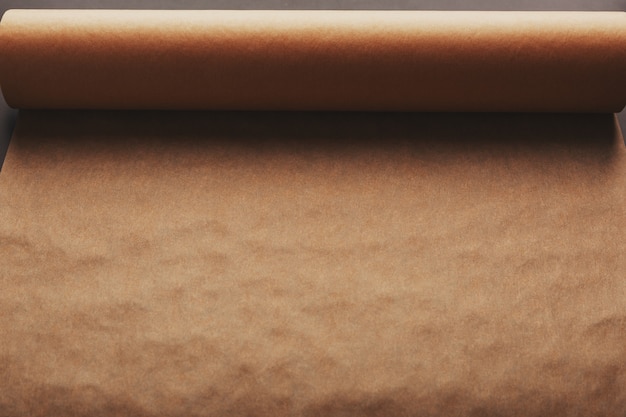 https://img.freepik.com/premium-photo/brown-rolled-baking-paper_94046-2977.jpg