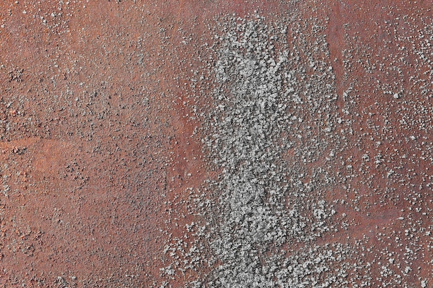 Brown rust and white fungus texture on iron sheet