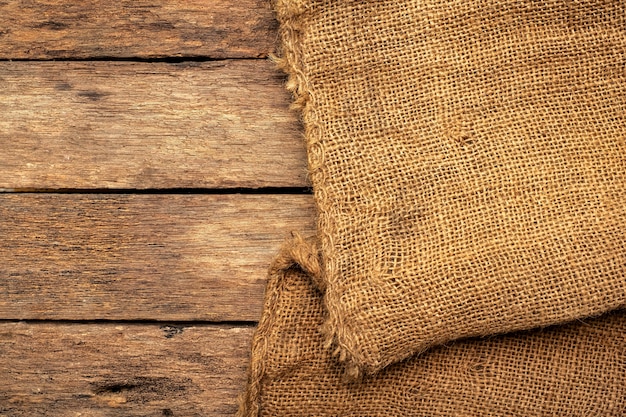 Photo brown sack on brown wood panel.