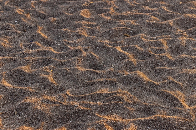 Brown Sand With Footprints Photo