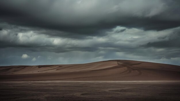 Photo brown sandy land under the dark cloudy grey sky