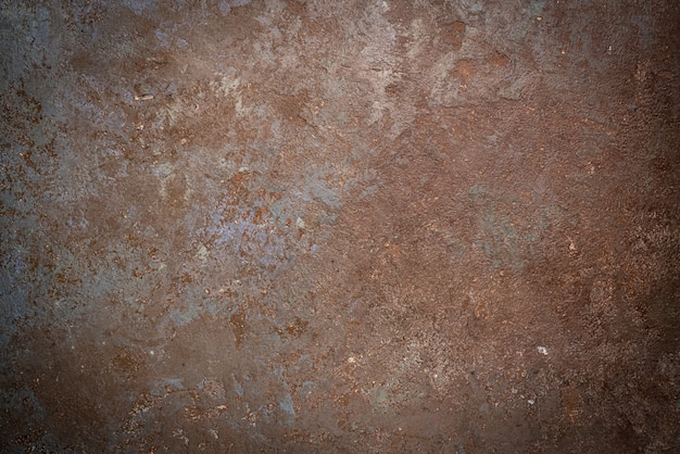 Brown stone or concrete wall background, top view texture