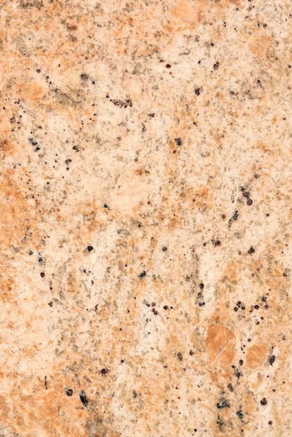 Brown stone with black spots background texture