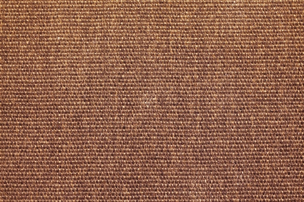 Brown straw carpet macro background texture