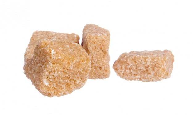 Photo brown sugar cubes isolated