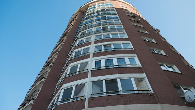 Brown tall apartment building facade