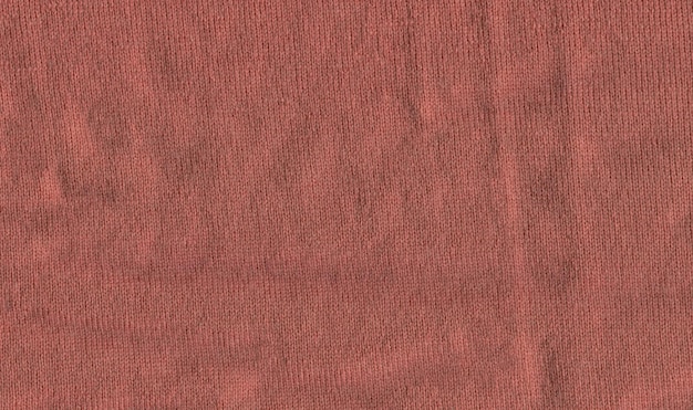 Brown vermillion knitted background with copy space