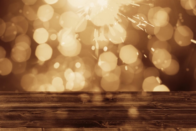 Brown vintage bokeh background with empty wooden deck table top for product montage display