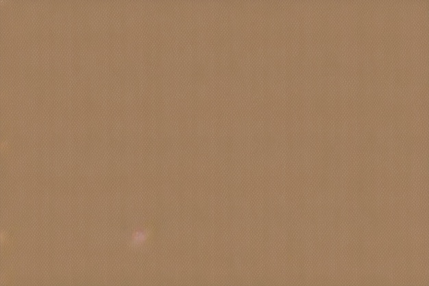 A brown wall with a white dot in the center