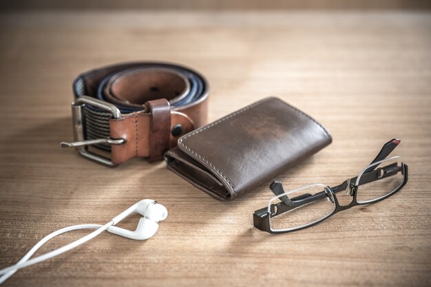 brown wallet,belt, spectacles,earphones  vintage style