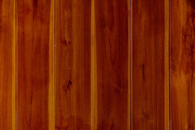 Brown wood floor, red wood background.