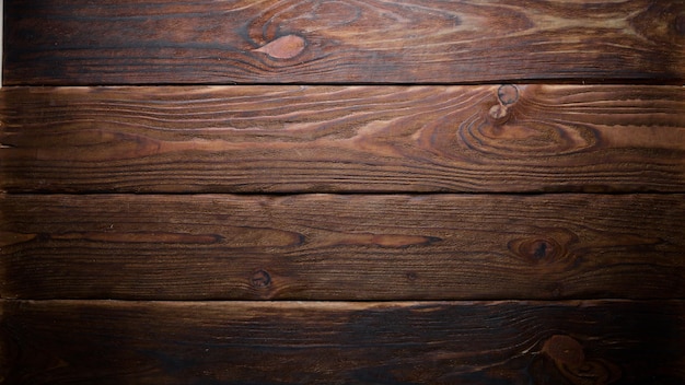 Brown wooden background Top view Free space for your text