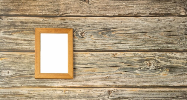 Brown wooden background with blank box