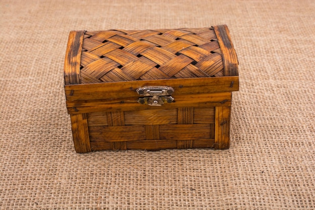 Brown wooden case on brown fabric