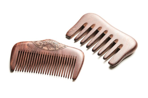 Photo brown wooden comb isolated on white background ecofriendly hairbrush