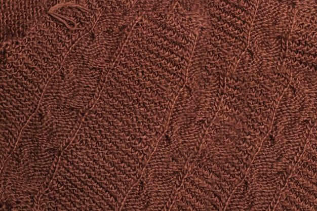 A brown wool scarf in a close up view