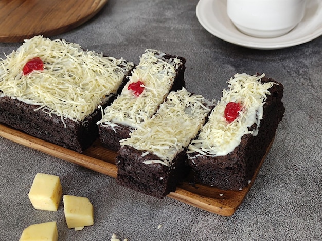 Brownies with red cherries on top