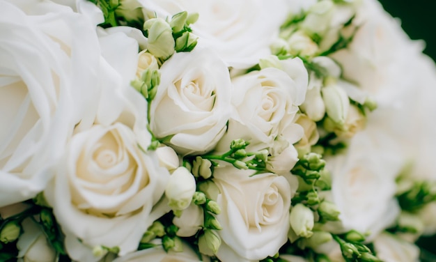 Foto bruiloftsboeket van witte rozen textuur van bloemen