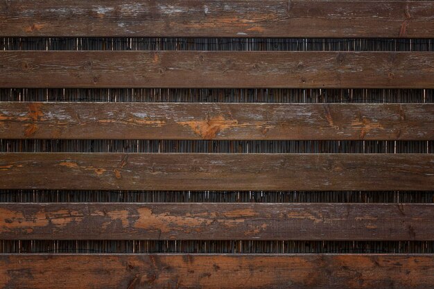 Bruin houten plank hek Achtergrondruimte voor tekst