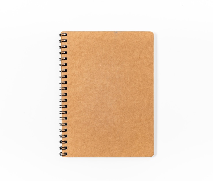 Foto bruin spiraal notebook geïsoleerd op wit background.top view
