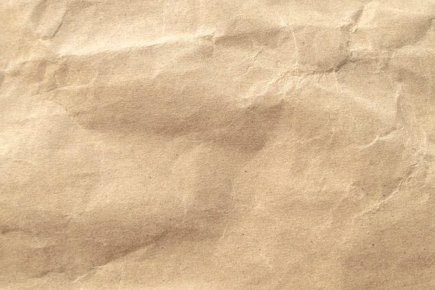 Bruin verfrommeld papier textuur achtergrond.