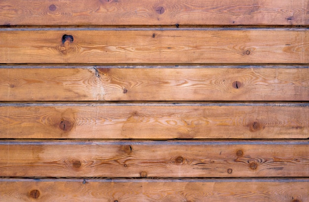 Bruine houten panelen horizontaal gerangschikt. Houten textuur &amp; achtergrond