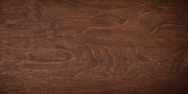 Bruine planken als een sjabloon voor een achtergrond met een donkere houtstructuur