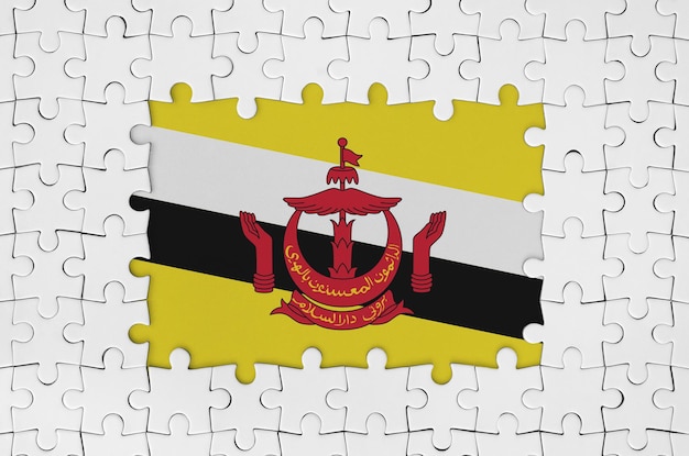 Brunei Darussalam flag in frame of white puzzle pieces with missing central part