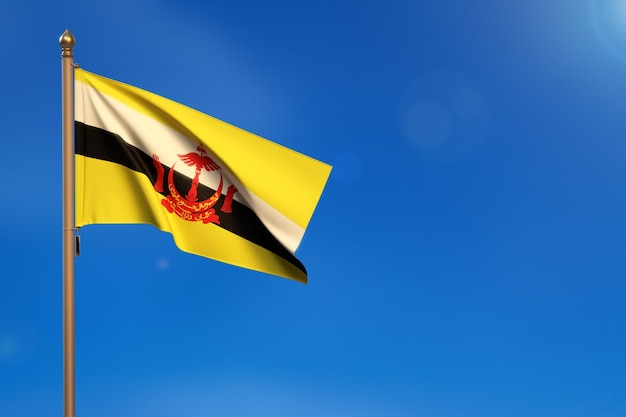 Brunei Flag blown by the wind with blue sky in the background