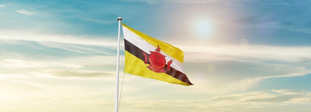 Brunei national flag waving in beautiful sky