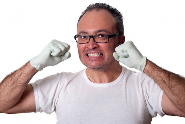 Brunet man in white gloves shirt eyeglasses looking at camera