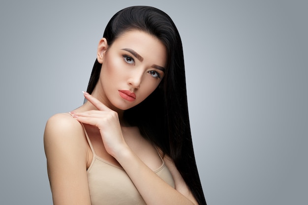 Brunette asian girl with long straight hair