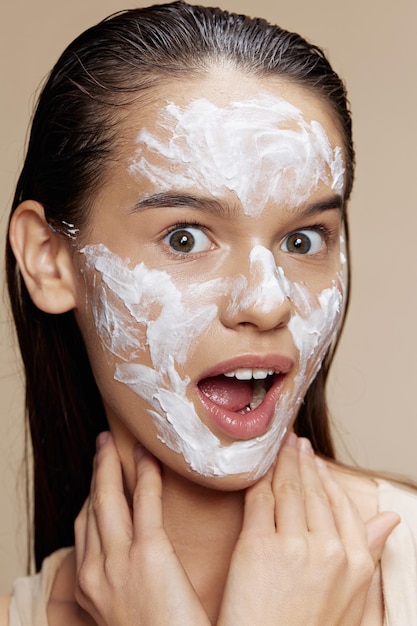 Brunette face mask cream clean skin facial scrub closeup